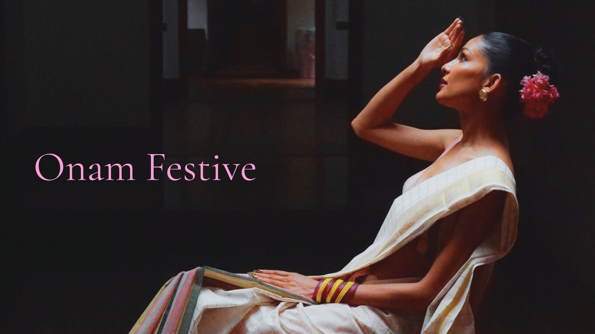 Woman in traditional kerala handloom cotton saree for Onam festive collectio.